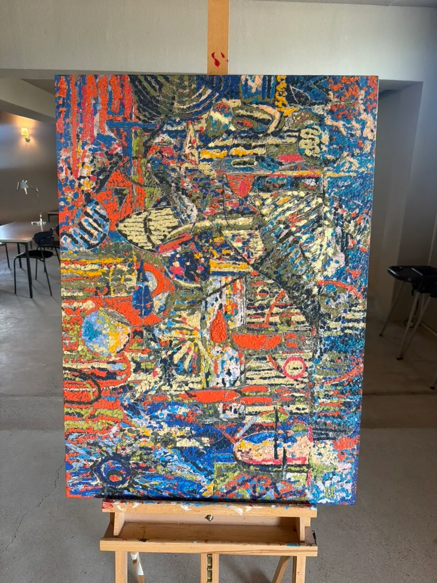 Paintings displayed throughout the café