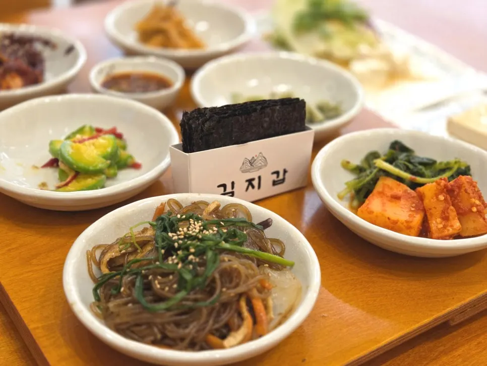 Japchae and seaweed in the set menu spread