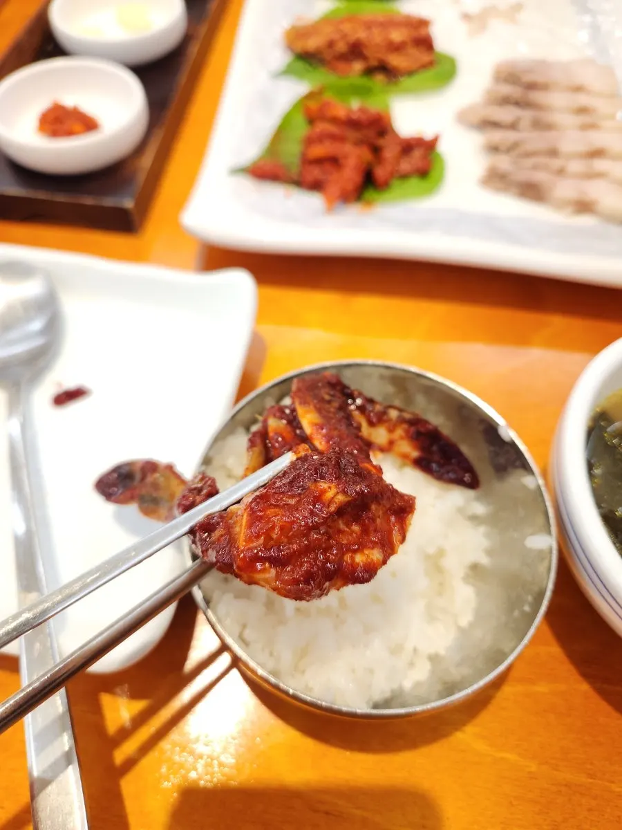 Table with grilled mackerel and banchan