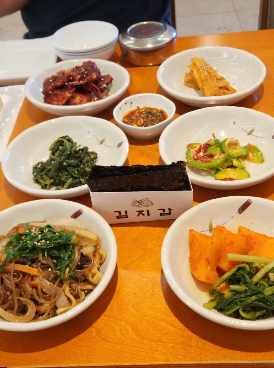 Plates of lightly seasoned banchan