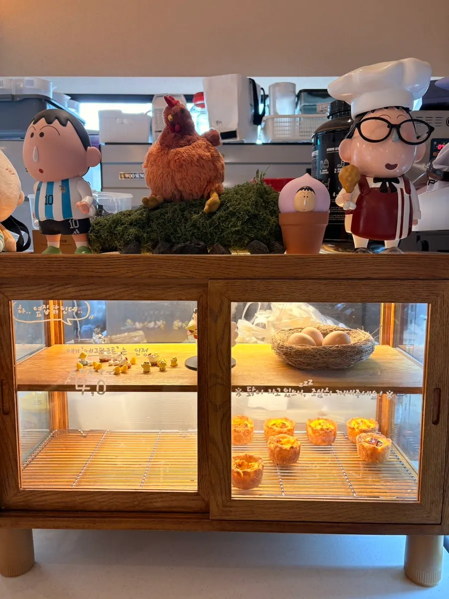 Bread and cakes on display at Yu Yu Yu's bakery counter