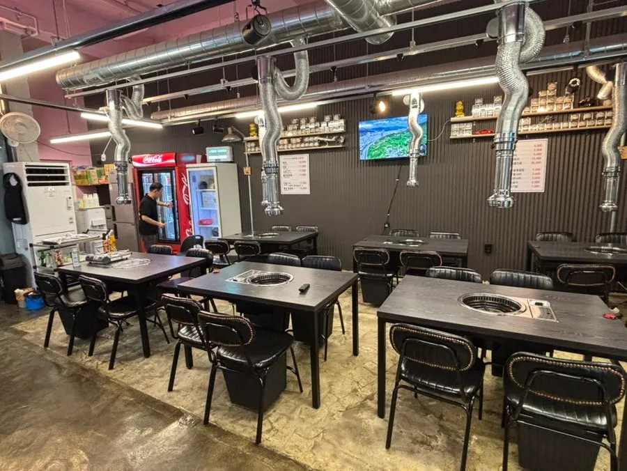 Interior of Miracle Yang Gopchang with generously spaced tables
