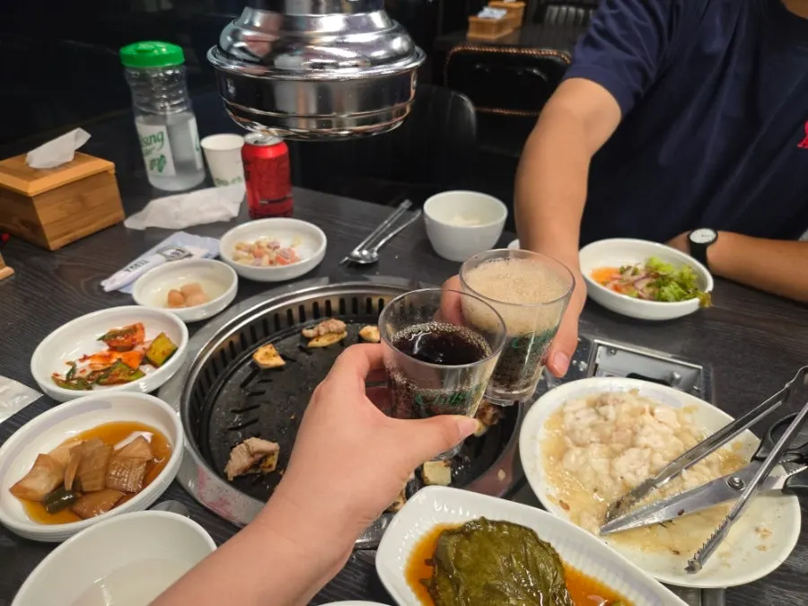 Teukyang dipped in the homemade pineapple sauce