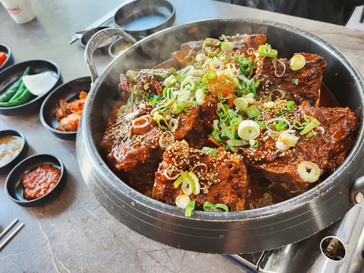 Bone stew topped with beef intestine