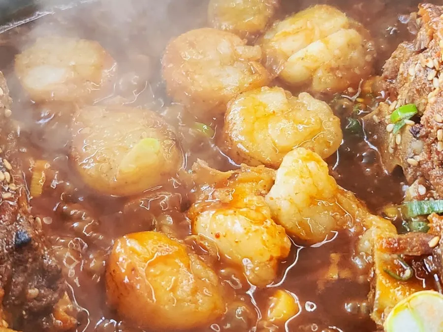 Beef intestine bone stew simmering