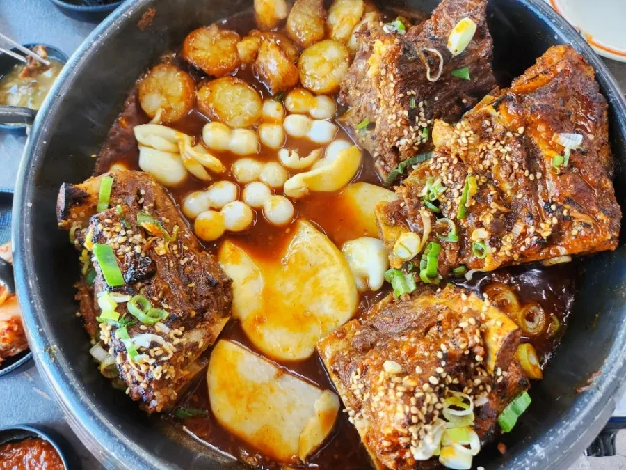 Bone stew simmering with add-ins
