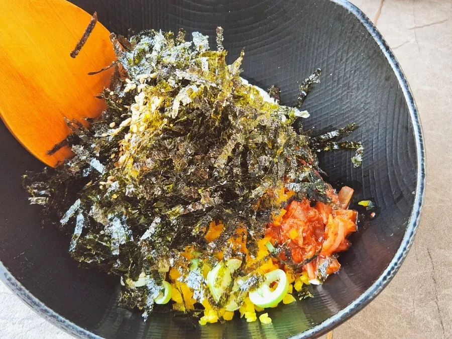 Self-service fried rice with seaweed flakes and ingredients