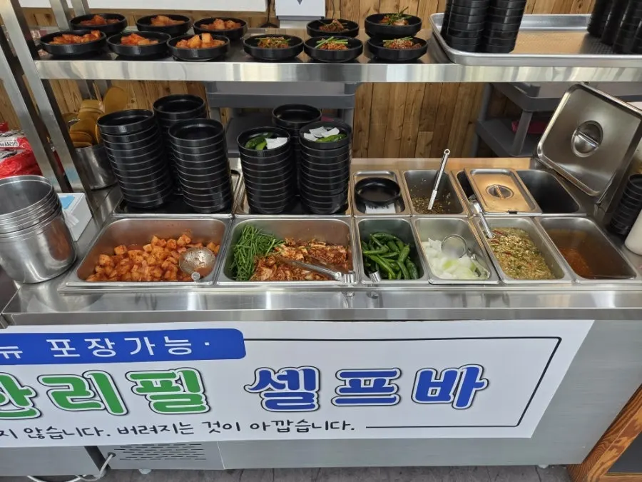 Self-serve bar with unlimited dumpling, glass noodle, ramyeon and other add-ins