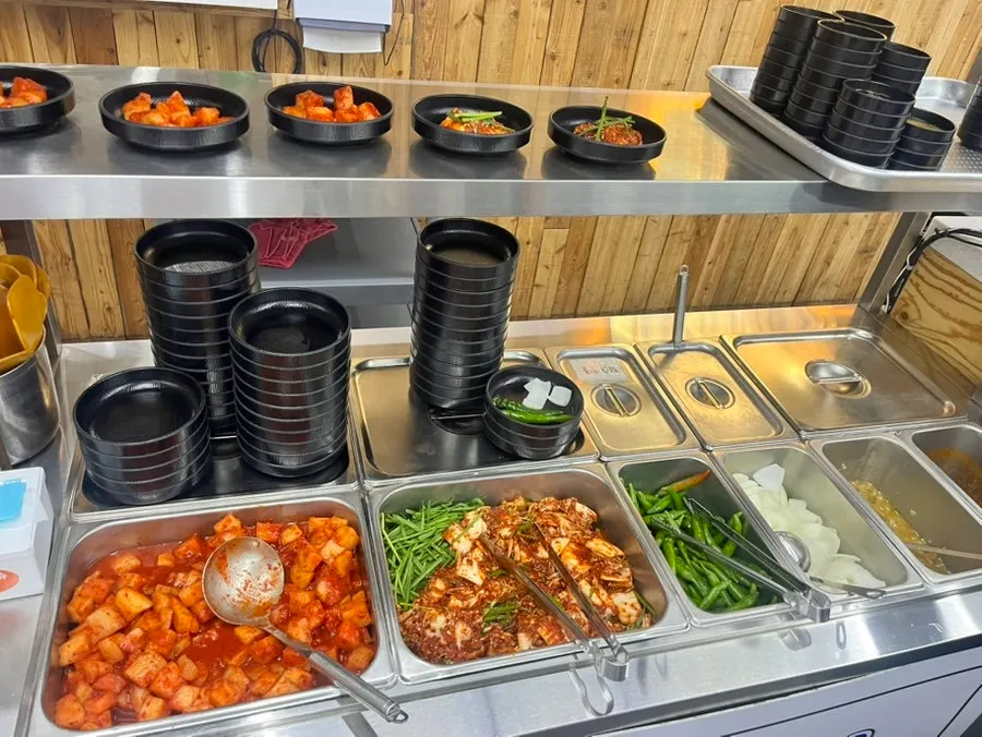 Salad bar with glass noodles, ramyeon, sujebi and potato add-ins
