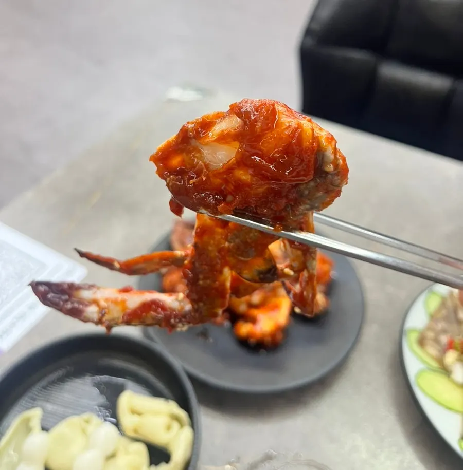 Table set with boiled pork and marinated crab together for two