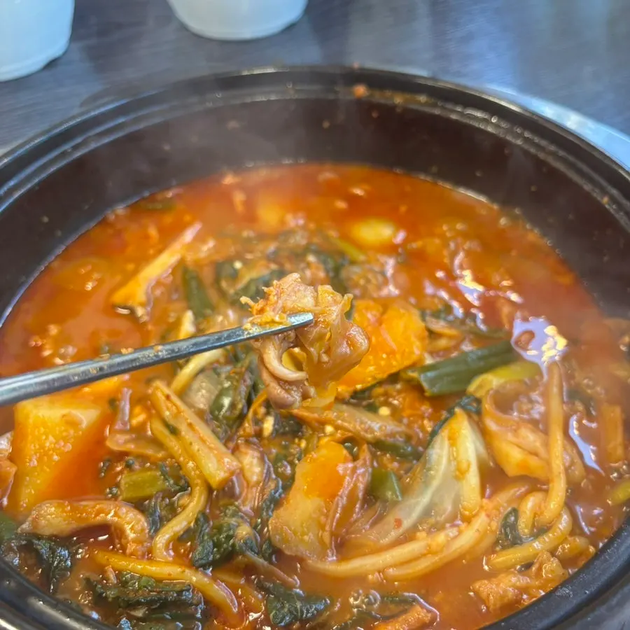 Close-up of daechang pulled from the hot pot
