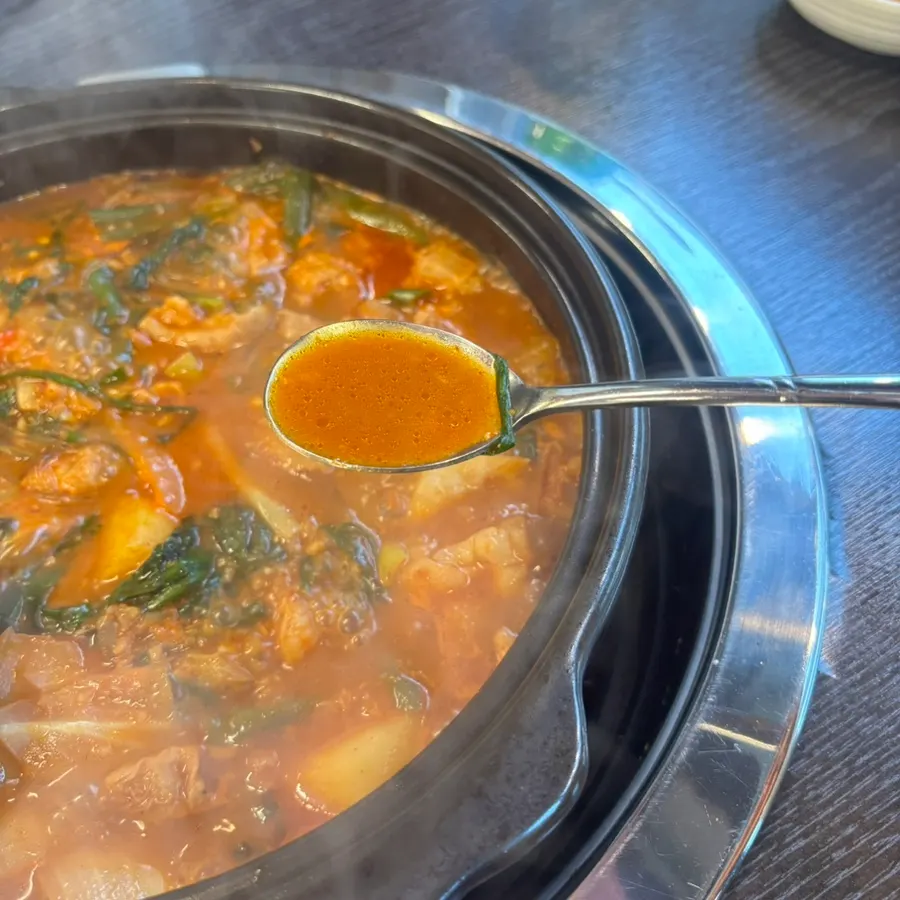 A bowl of hot pot generously filled with gopchang
