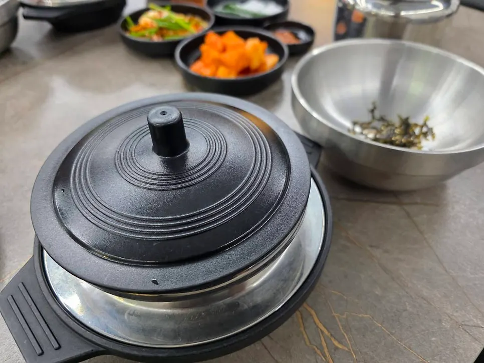 Table setting with haejangguk and rice