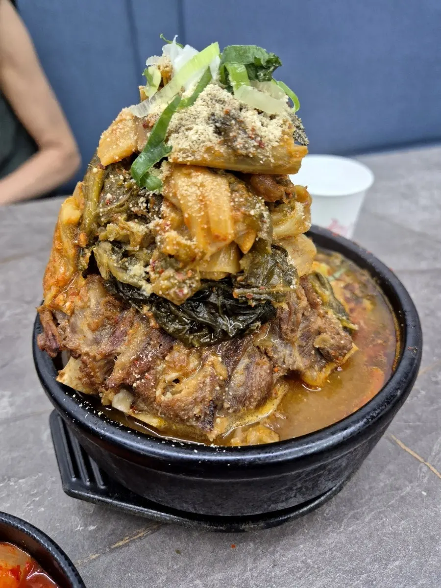 Pork bone soup filled with siraegi greens