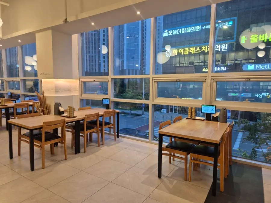 Wood-tone interior of the main dining hall