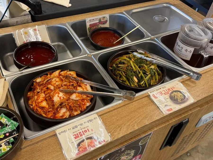 Self-serve bar where diners scoop their own side dishes
