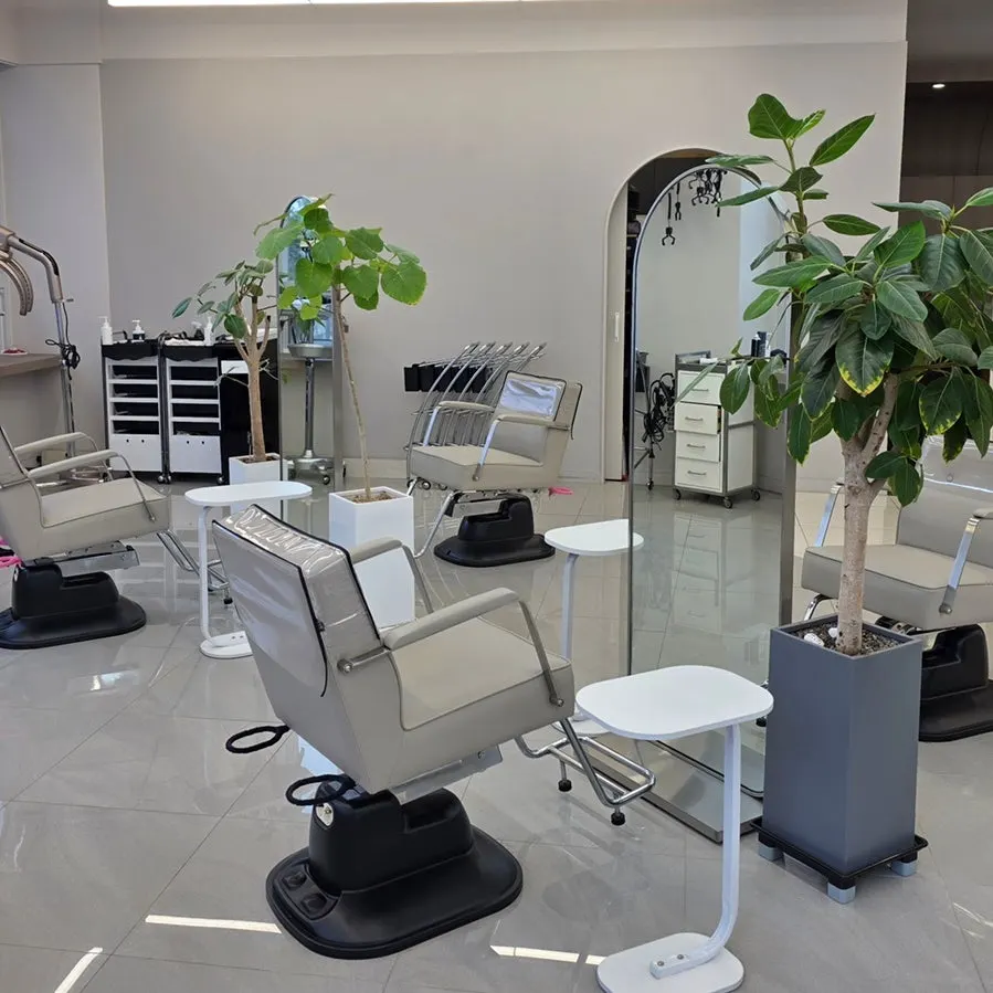Salon seating with generous spacing between stations