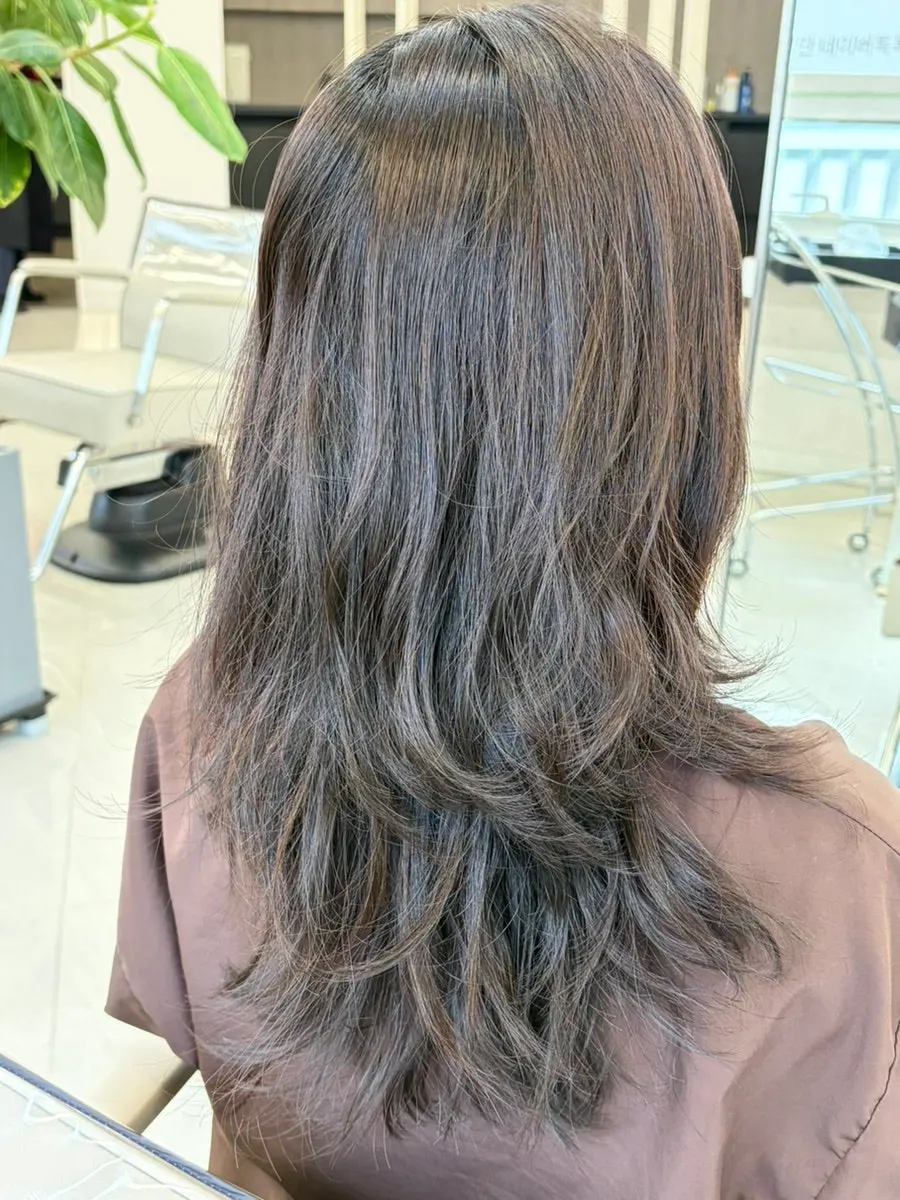 Long, unkempt hair before the service