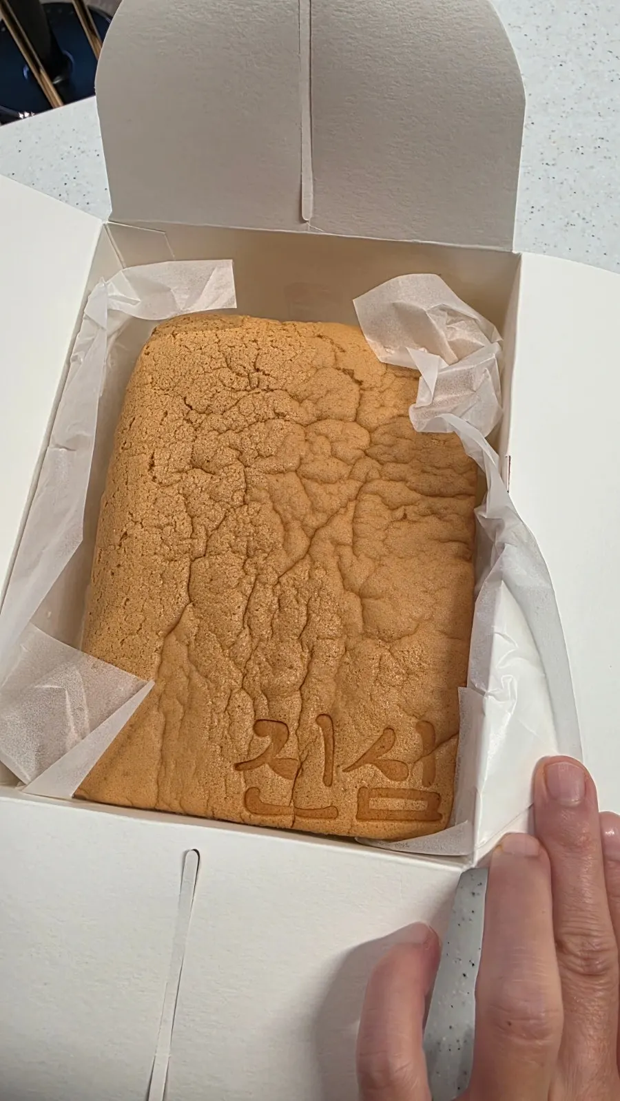 Castella in its dedicated box
