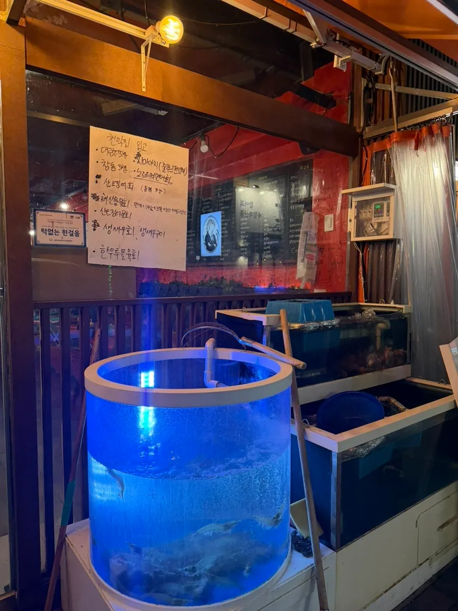 Seafood tank set up in front of the restaurant