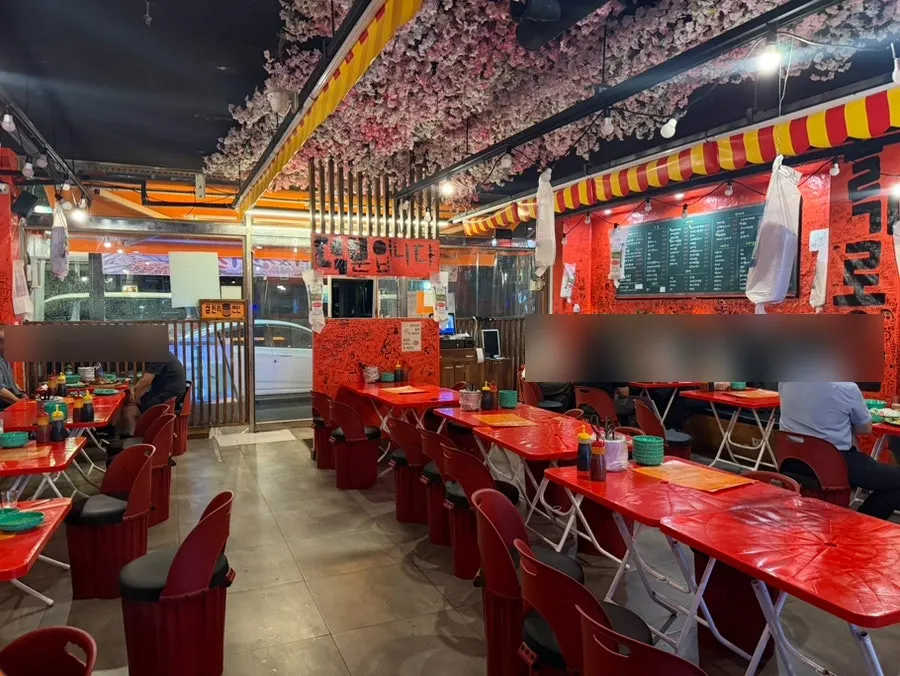 Street-food tent style seating that puts you in the mood for a drink