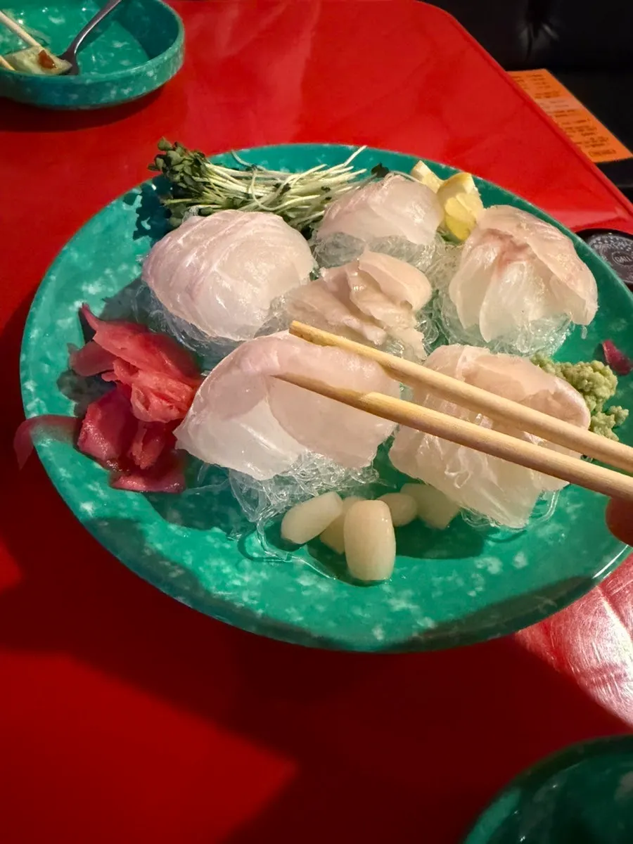 Close-up of glossy giant flounder sashimi