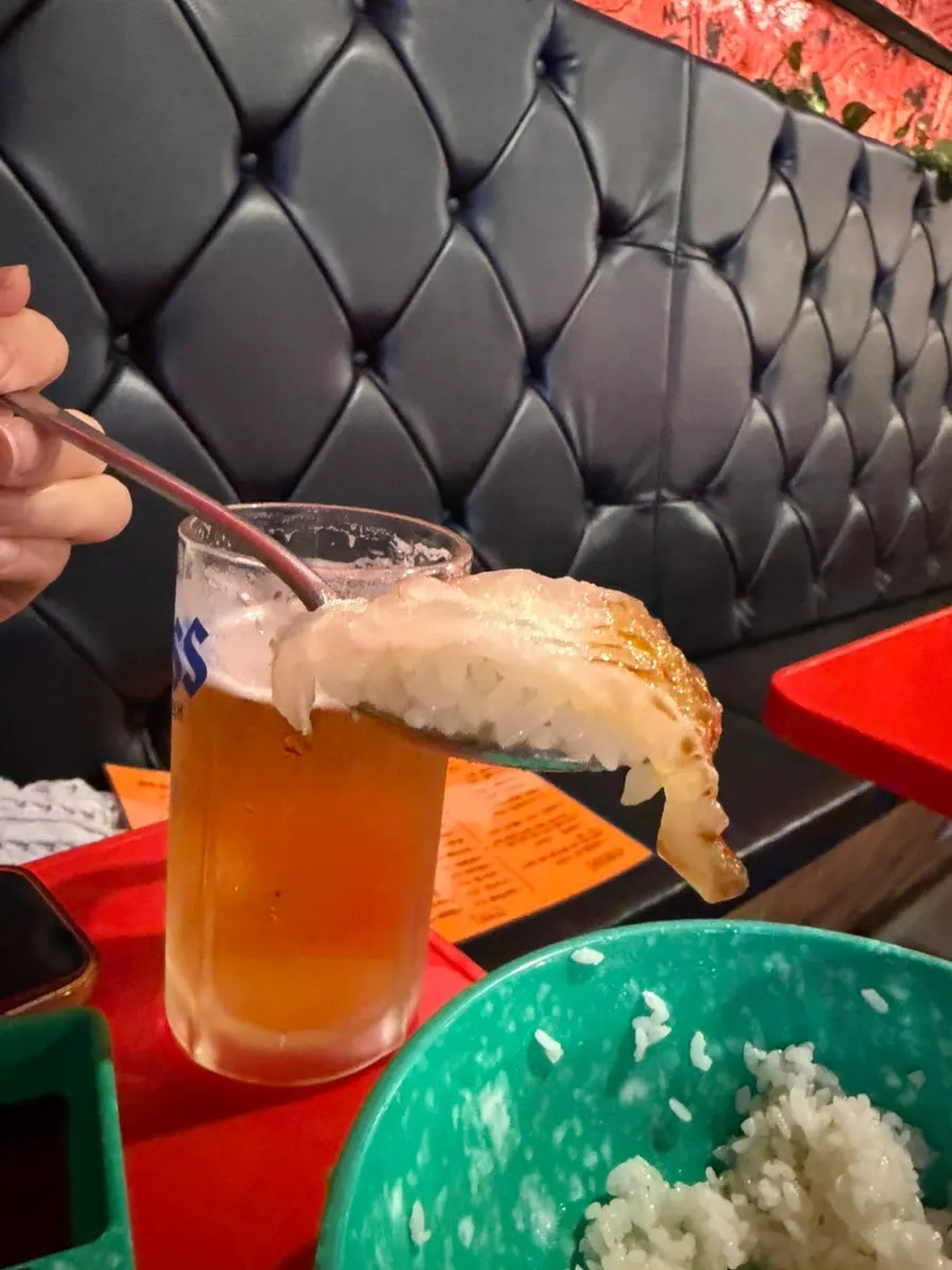 Hand-rolled sushi made by topping chodari-bap with sashimi