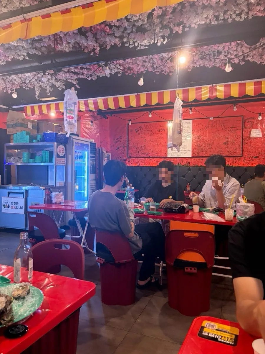 Pojangmacha-style interior with graffiti