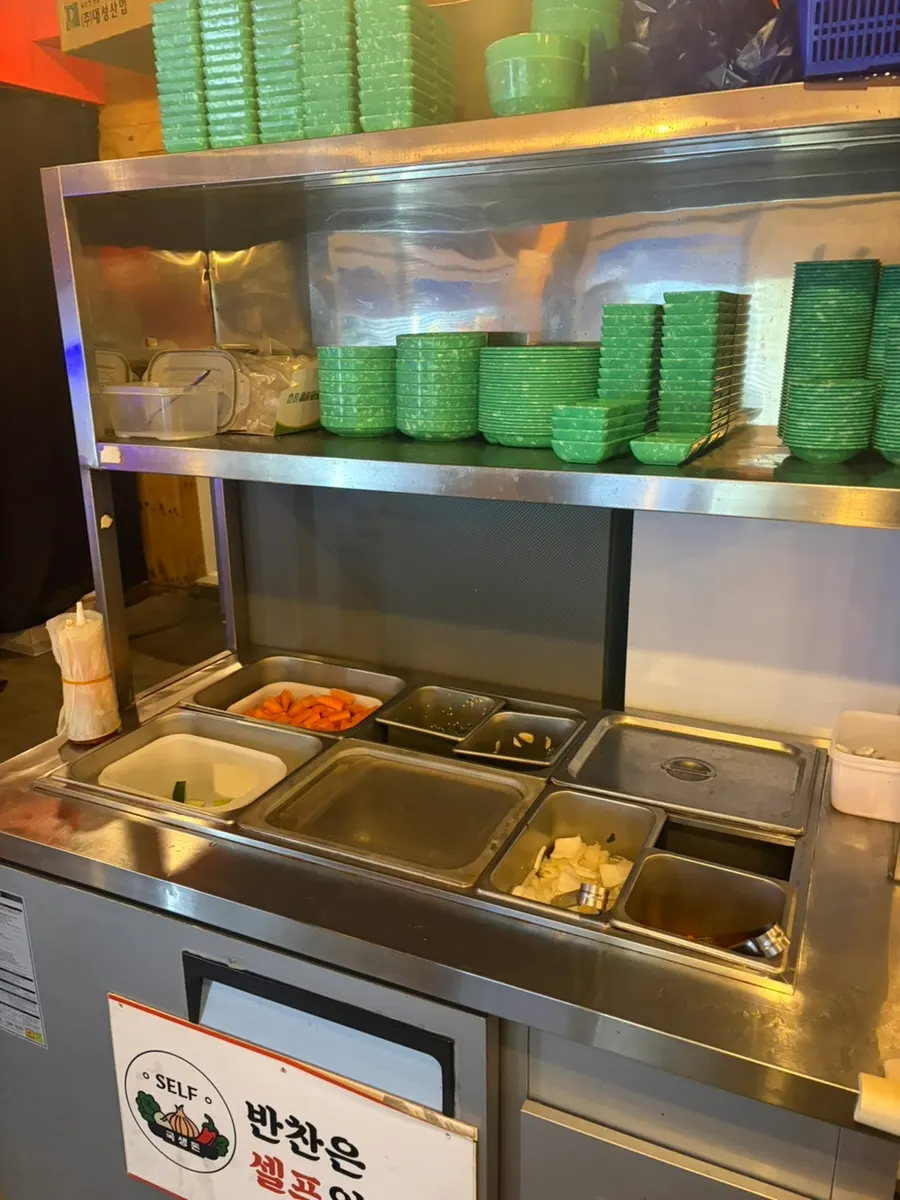 Basic spread of raw carrot, cucumber, and bean sprout soup