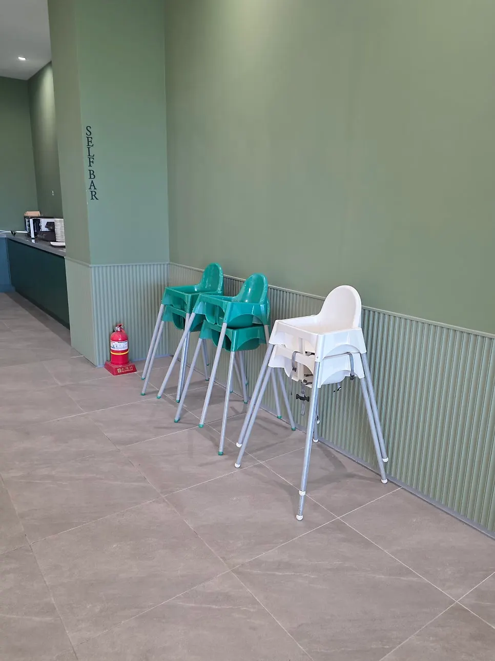 Atmospheric café space with full-length mirrors