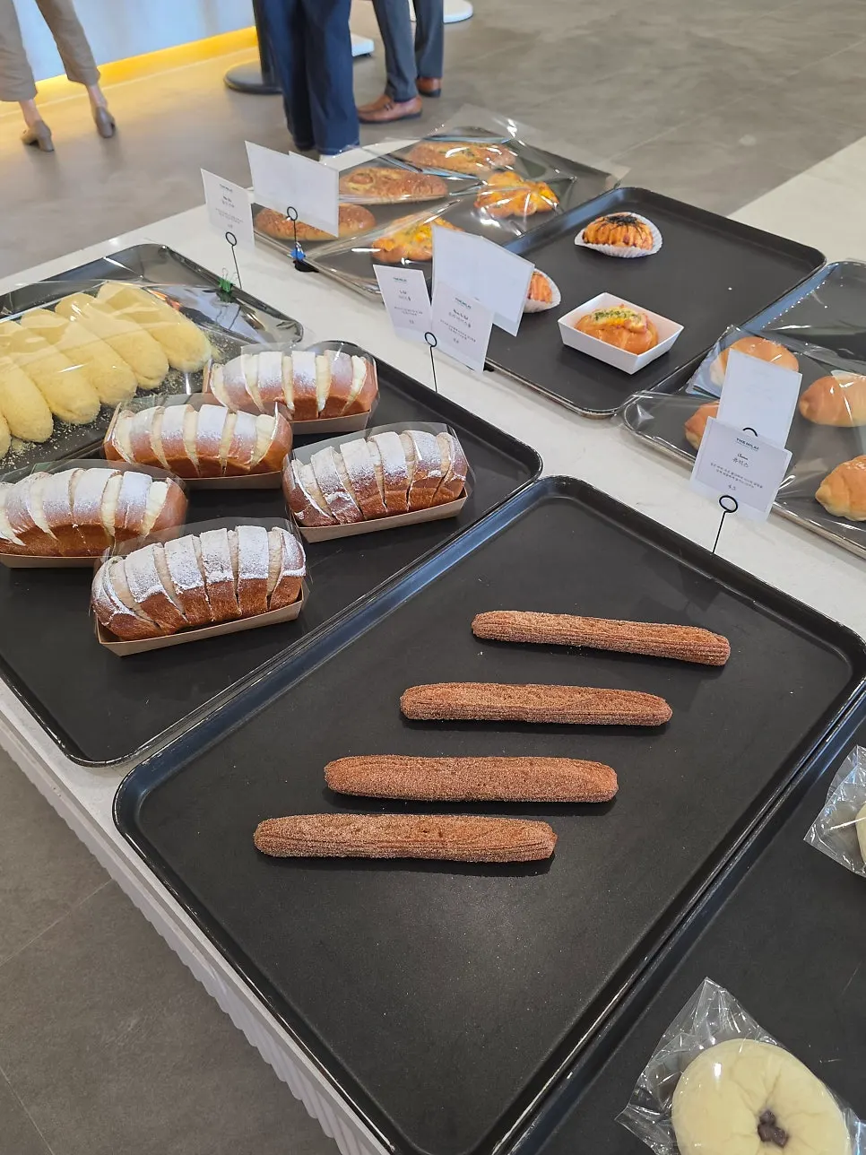 Bakery items including egg tarts and fresh milk bread