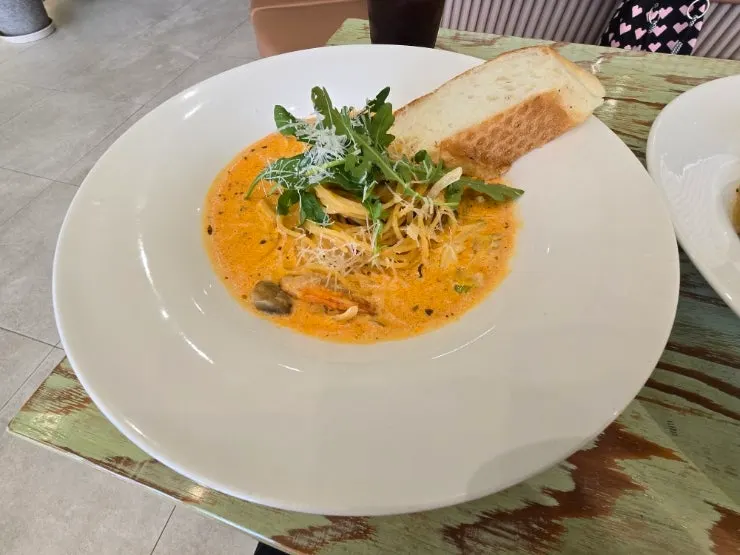 Iced Americano served with pasta