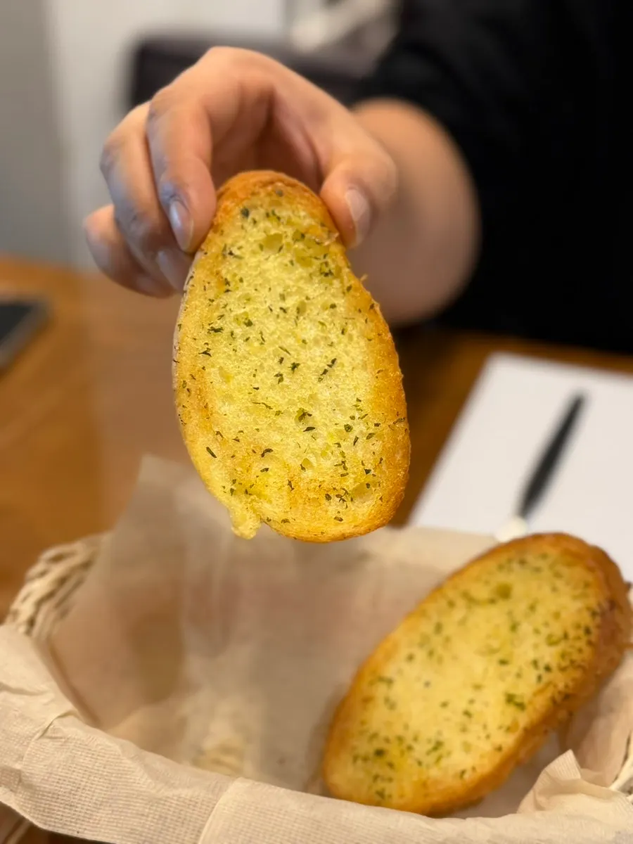 Crispy garlic bread served alongside the soup