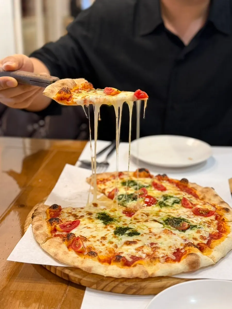 Margherita pizza with a savory cheese flavor