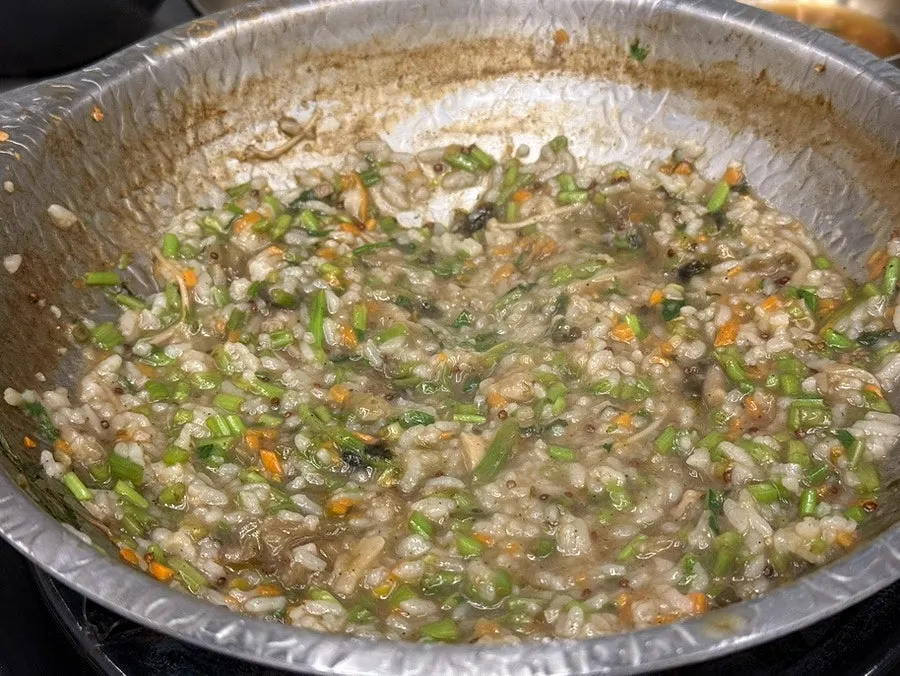 Rye kalguksu noodles added into the boiling broth
