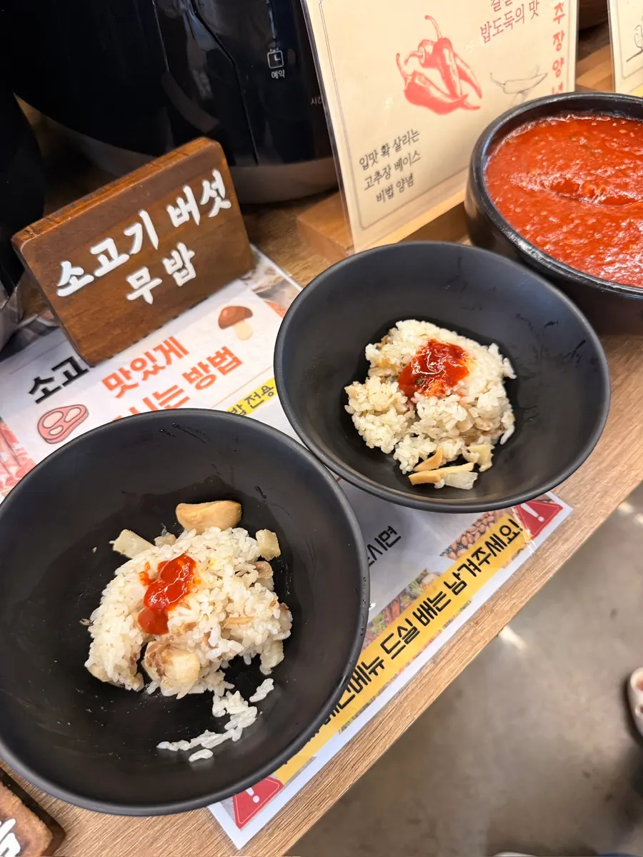 A table piled high with self-bar dishes