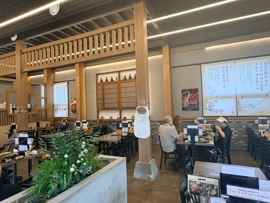 View of the Homilwon dining hall with generous table spacing