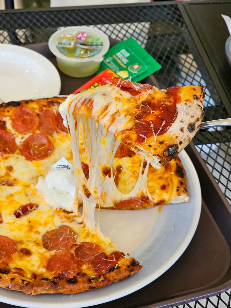 Pepperoni pizza with stretchy cheese