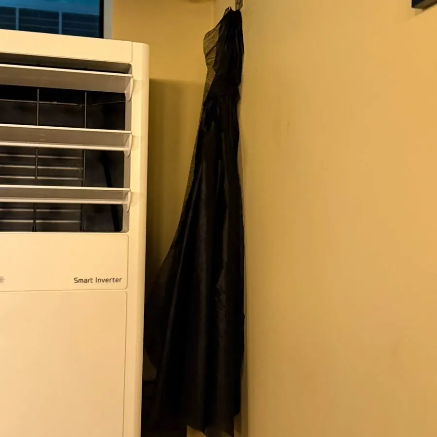 Corner of the restaurant with an apron and water dispenser