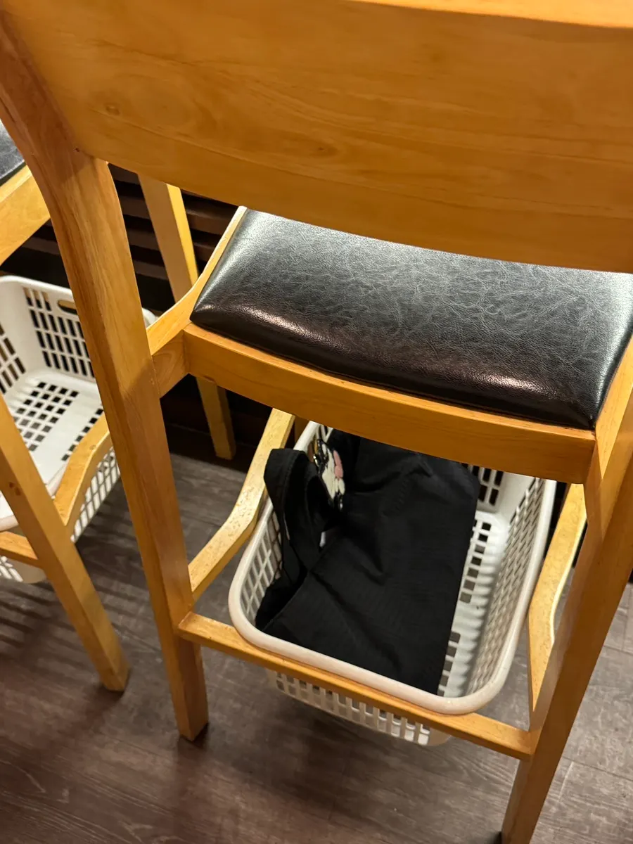 Basket for storage under each chair