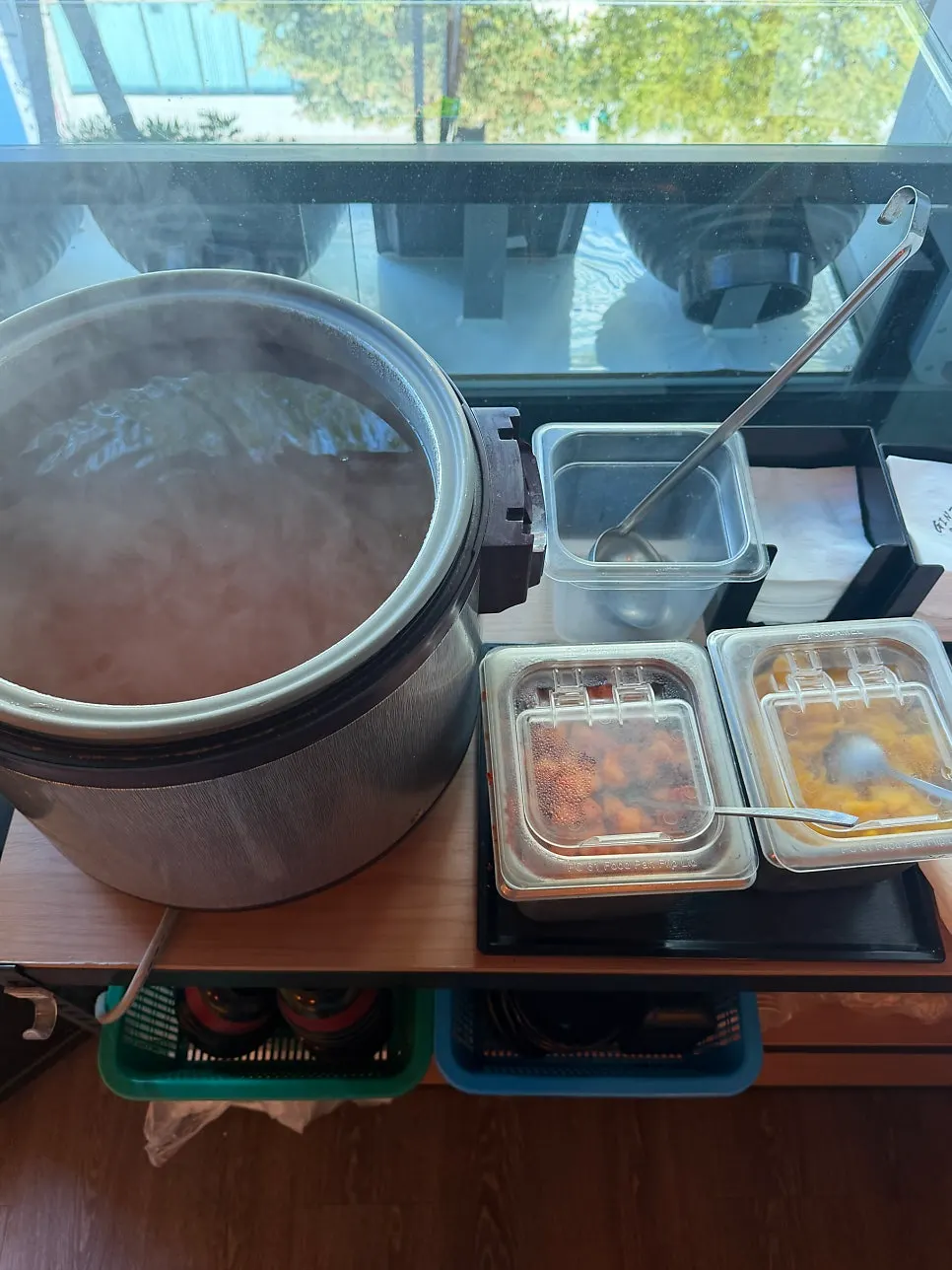 Self-bar with miso soup, kimchi, and pickled radish