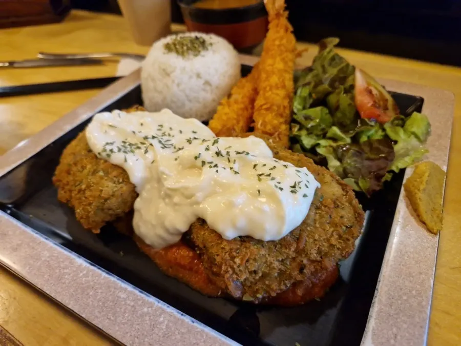 Cross-section of pork cutlet soaked in demiglace sauce