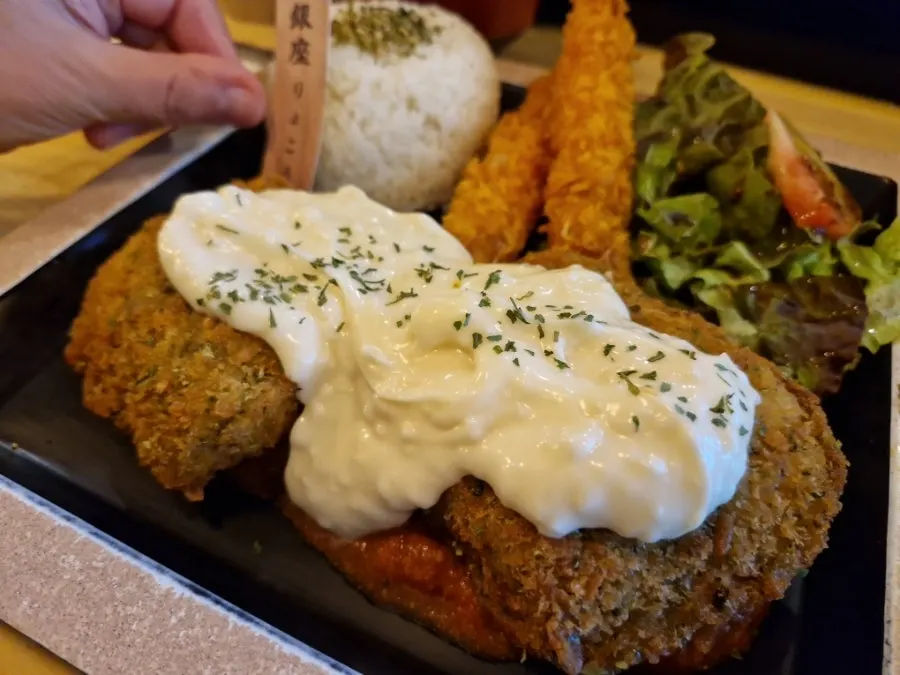Potato croquette and jumbo shrimp tempura side dishes