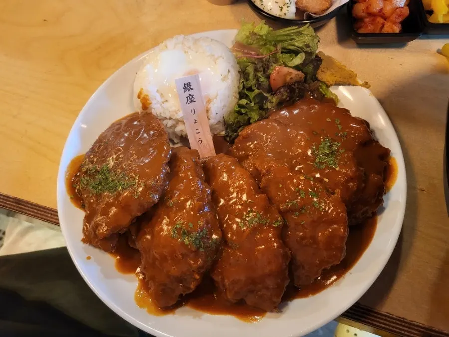 Table setting of the jumbo demiglace pork cutlet sized up 1.5x at Gin Jaryoko