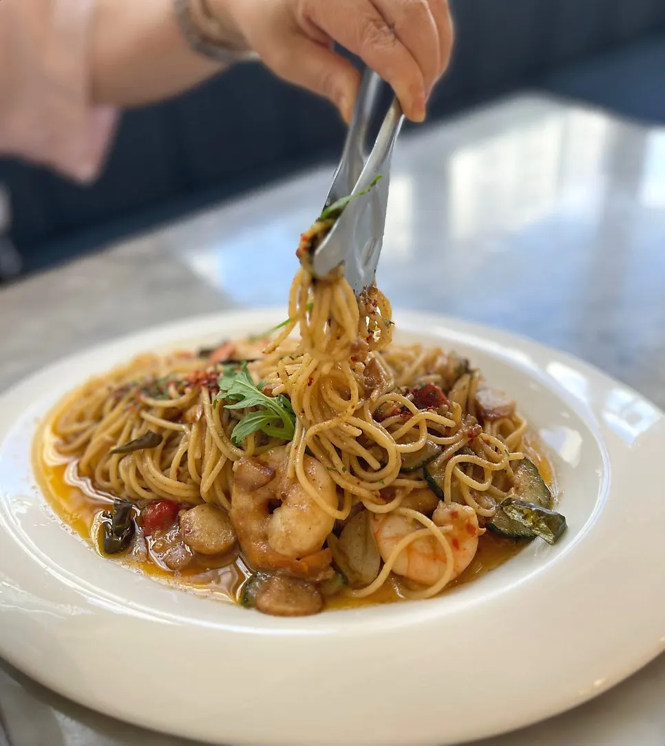 Close-up of anchovy oil pasta with shrimp and garlic