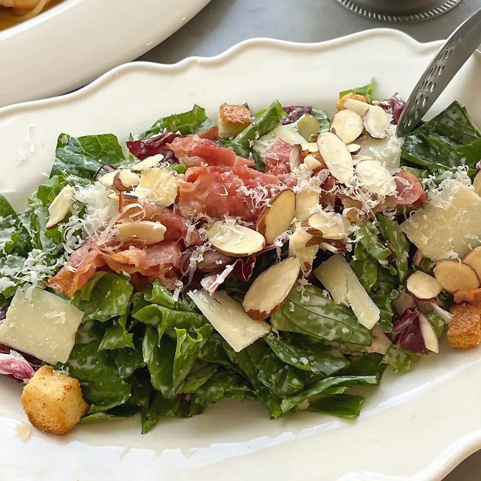 House Caesar salad piled with toppings