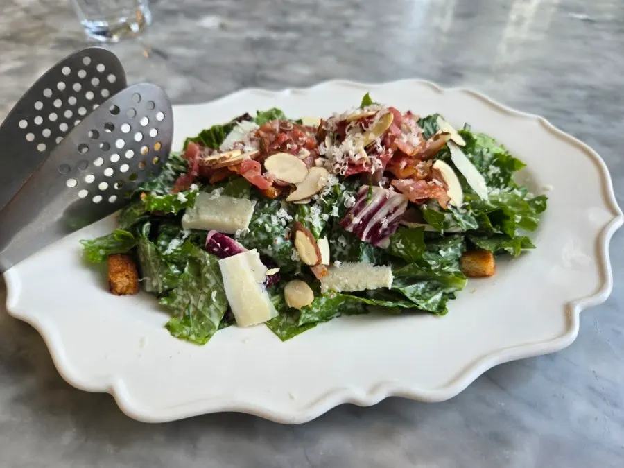 House Caesar salad served first