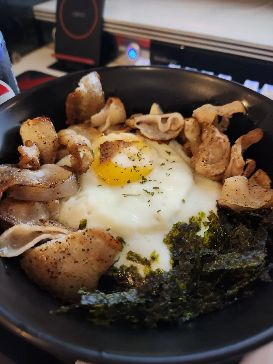 Ordering the spam mayo rice bowl with pork belly topping