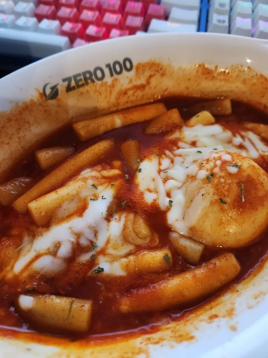Finished cheese tteokbokki served at the table