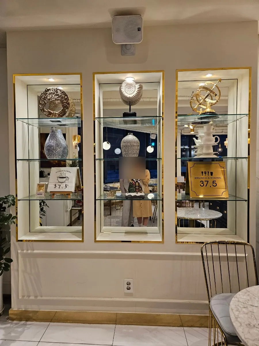 Antique display case next to the counter